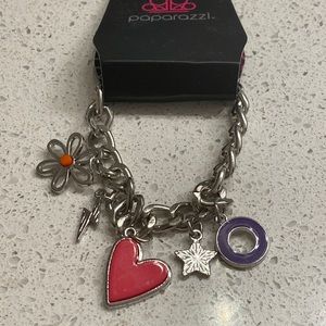 Silver chain bracelet with charms